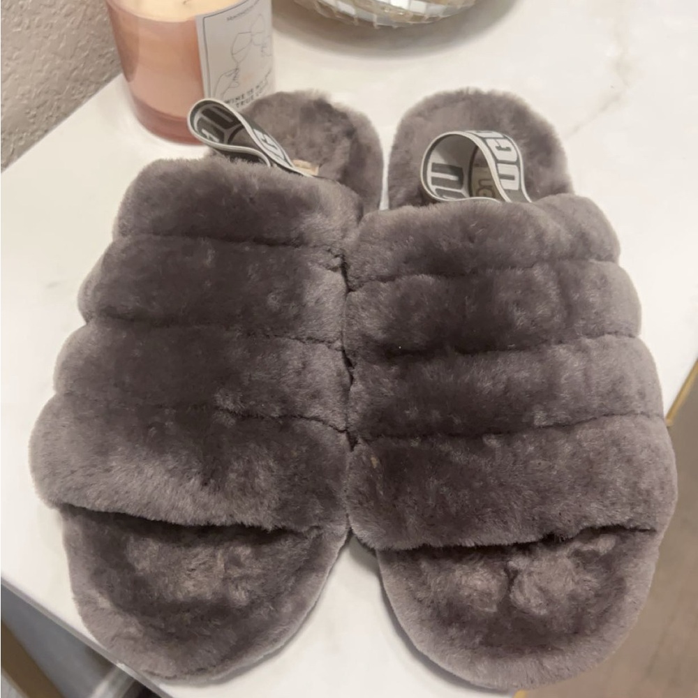 Use Uggs furry slides